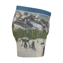 Load image into Gallery viewer, Designer Briefs of Skiers in Courmayeur Behind Maison Vielle
