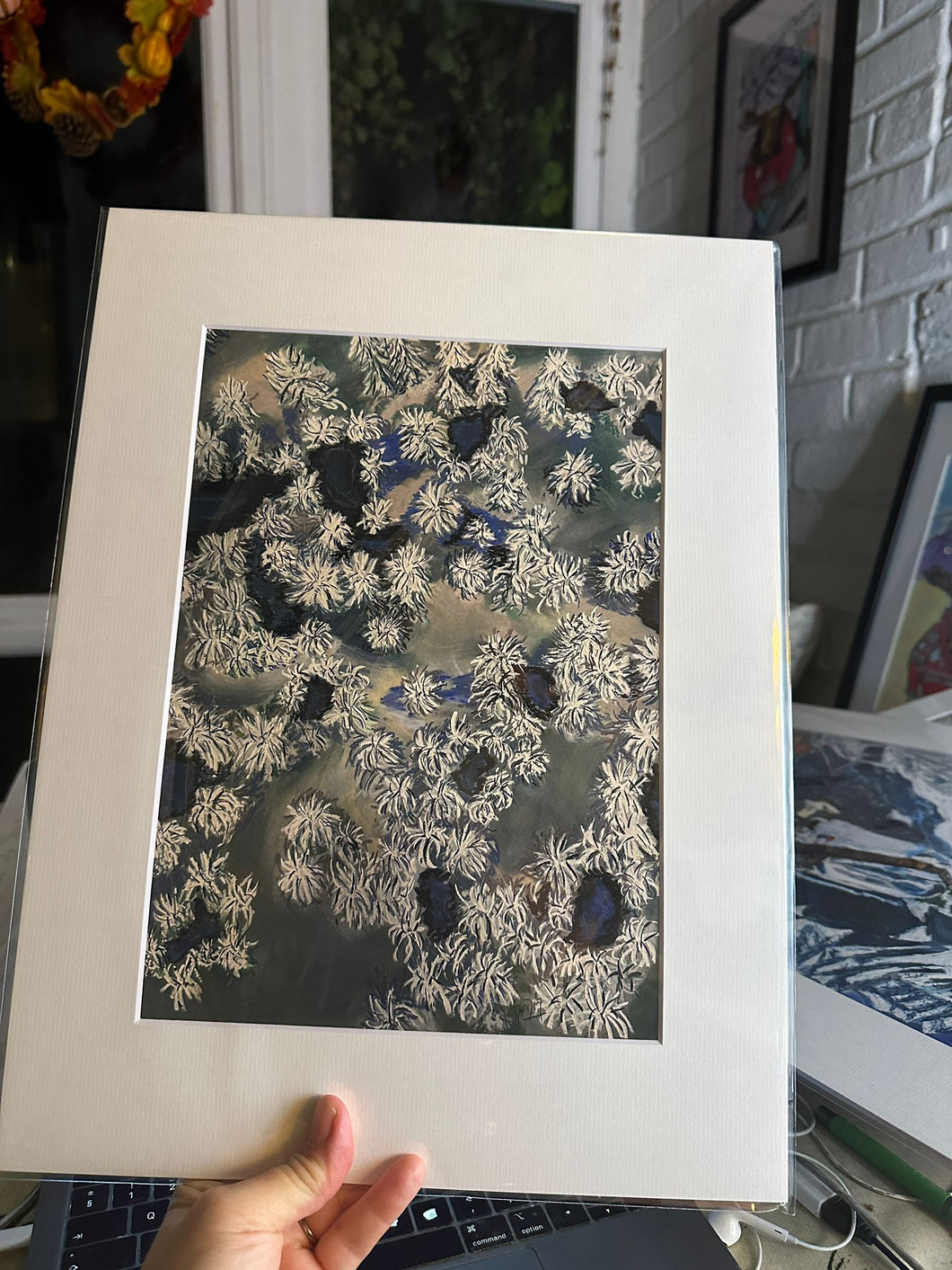 An A4 print of Snowy Pine Trees seen from Above with a 16